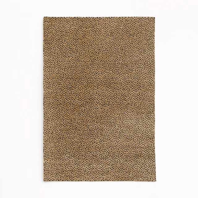 Warm taupe-brown chenille with dense charcoal flecks and a fine pebbled weave