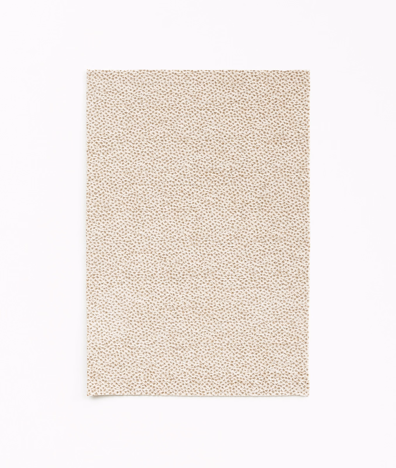 Warm cream chenille with biscuit flecks in a dense, pebble-like weave