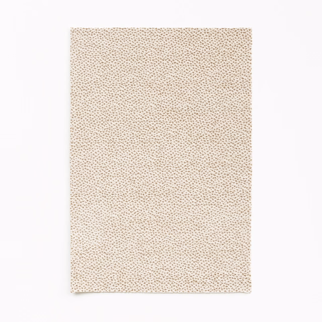 Warm cream chenille with biscuit flecks in a dense, pebble-like weave