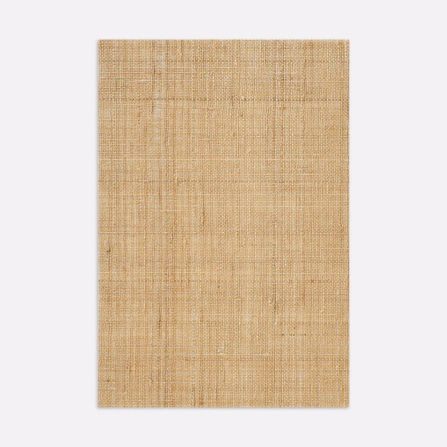 Warm wheat-beige woven fabric with fine irregular crosshatched texture