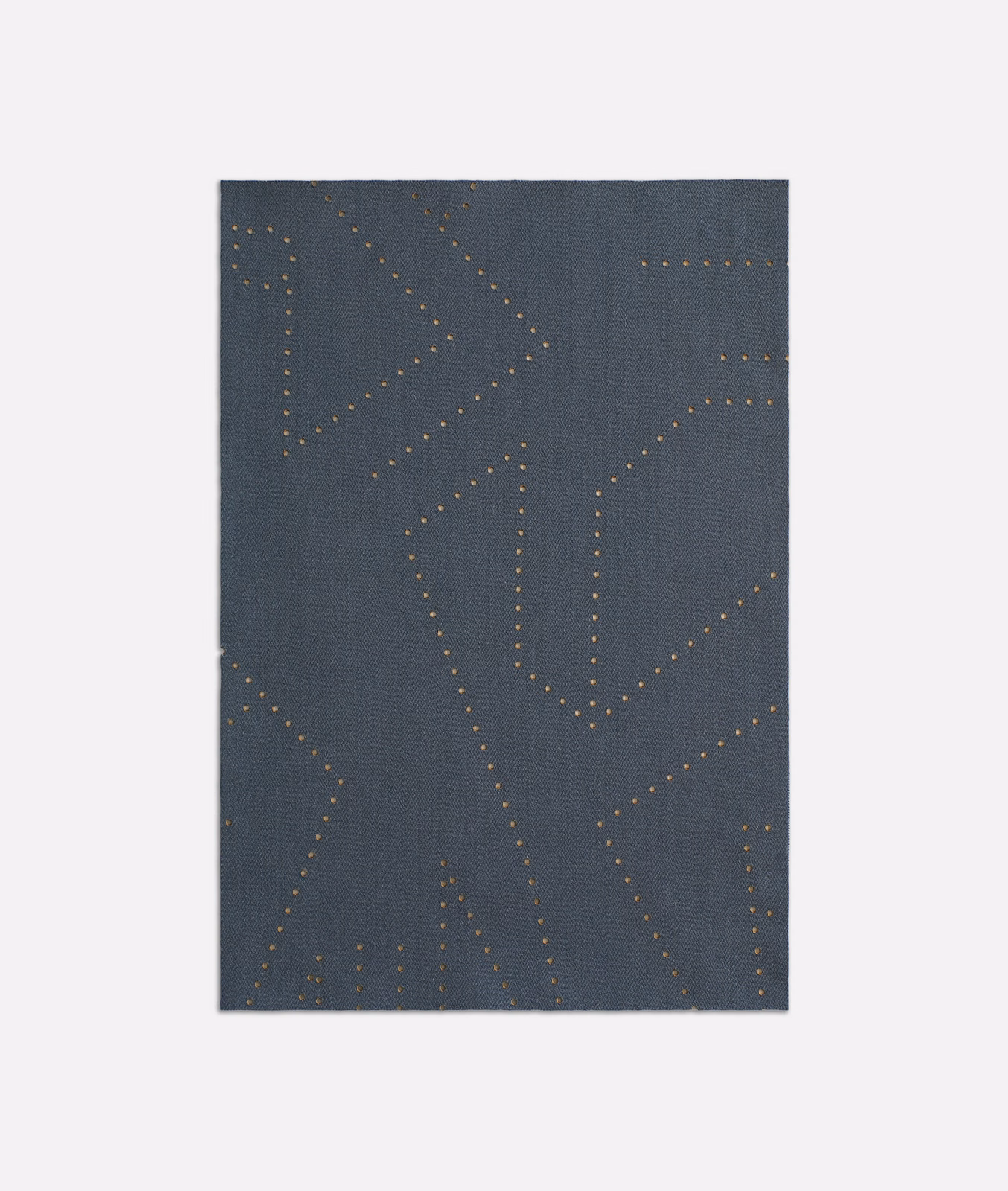 Deep slate-blue woven fabric with muted gold dotted, angular branching lines.