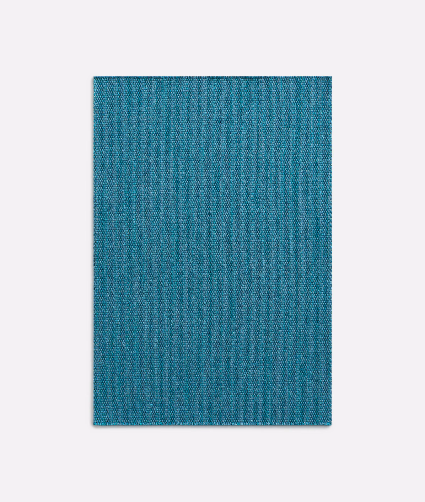 Cool teal denim-blue curtain fabric with a fine crosshatched plain weave