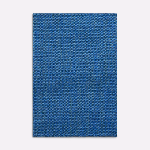 Deep denim-blue textile with fine vertical striations and a subtly textured weave