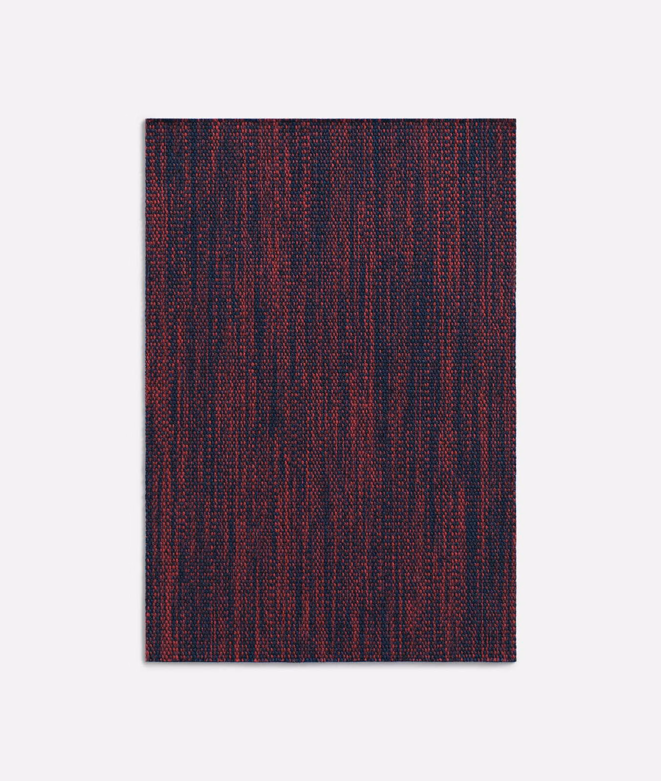 Ink-blue and burgundy woven swatch with fine irregular vertical striations