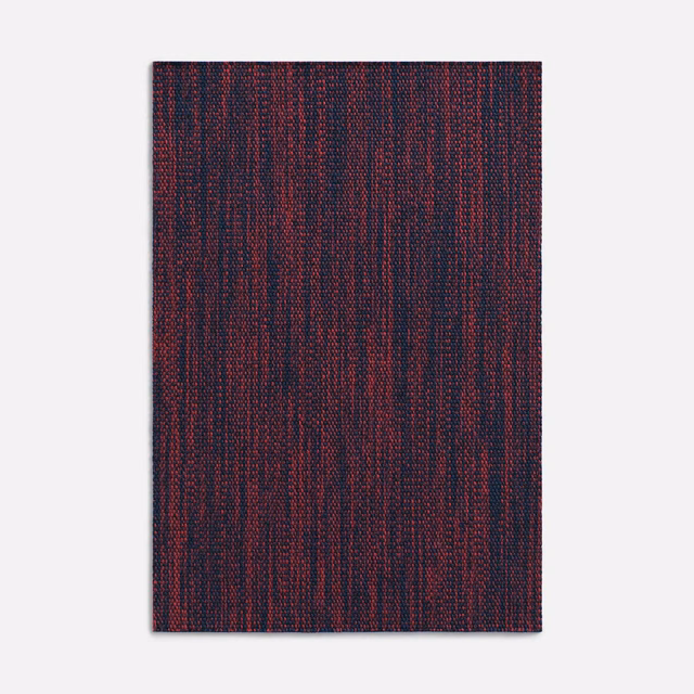 Ink-blue and burgundy woven swatch with fine irregular vertical striations