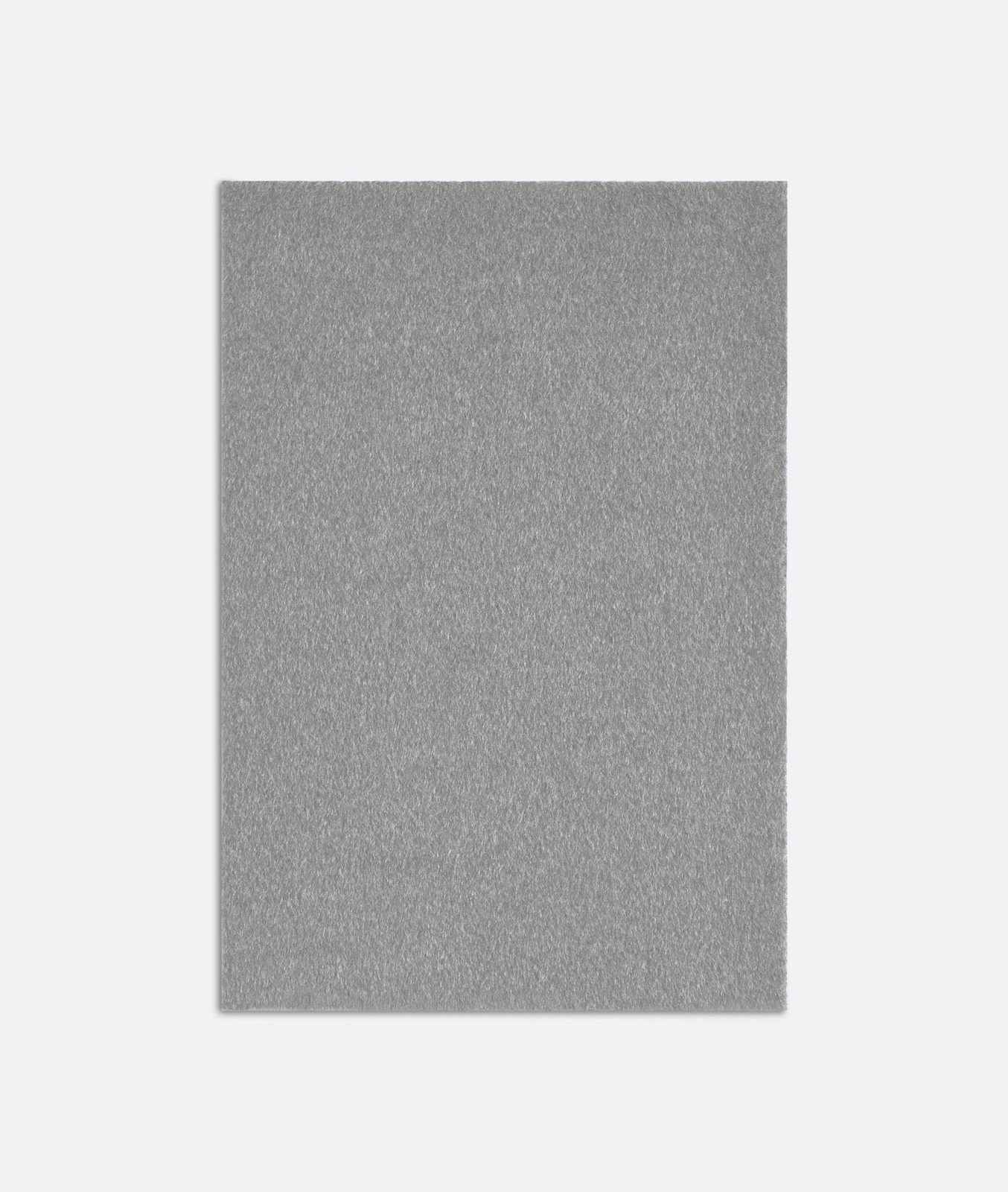 Cool silver-grey plain fabric swatch with fine softly mottled brushed texture