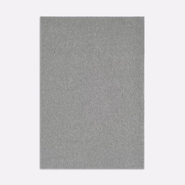 Cool silver-grey plain fabric swatch with fine softly mottled brushed texture