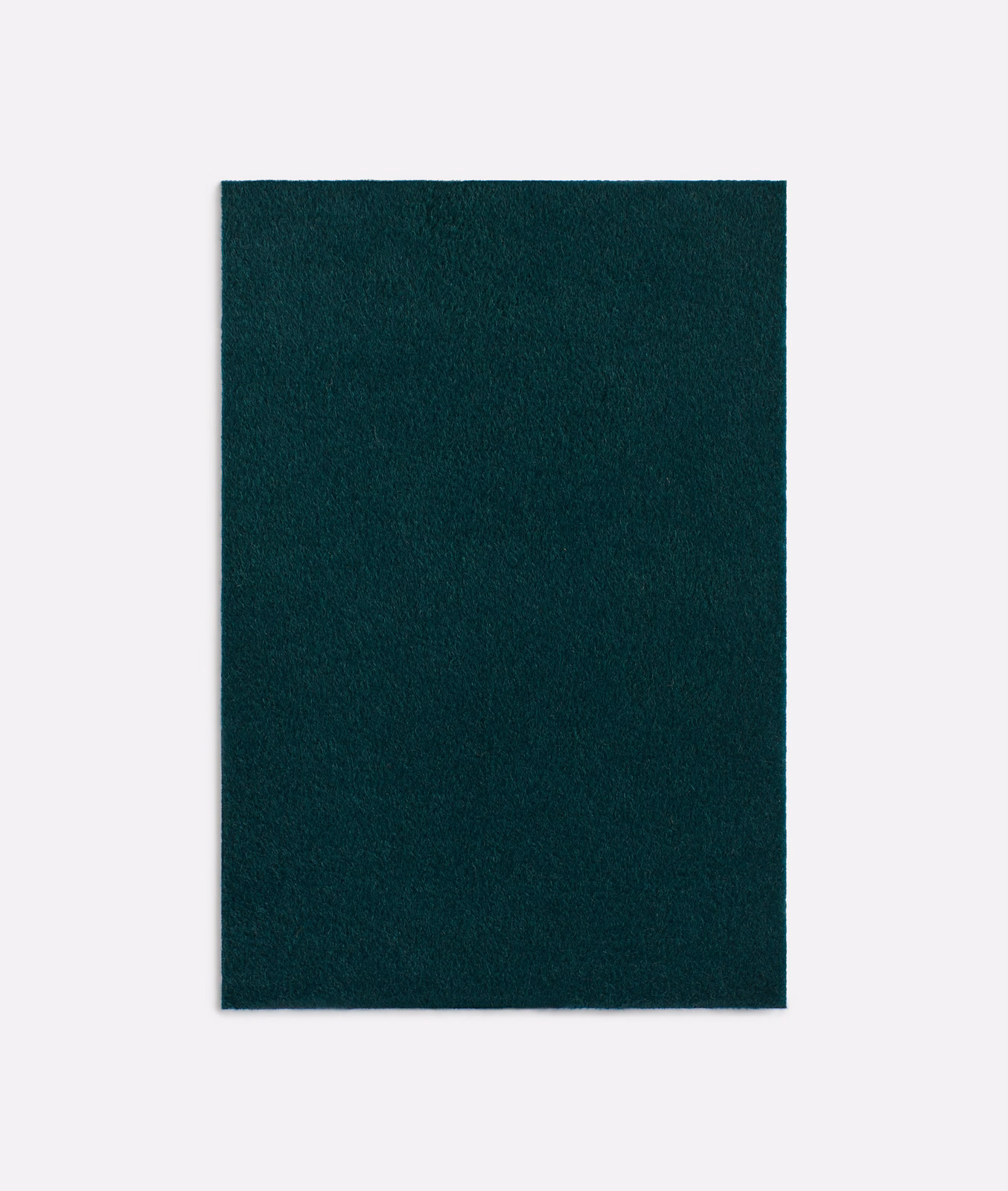 Deep forest-green Dedar fabric swatch with a softly brushed, tonal plain texture