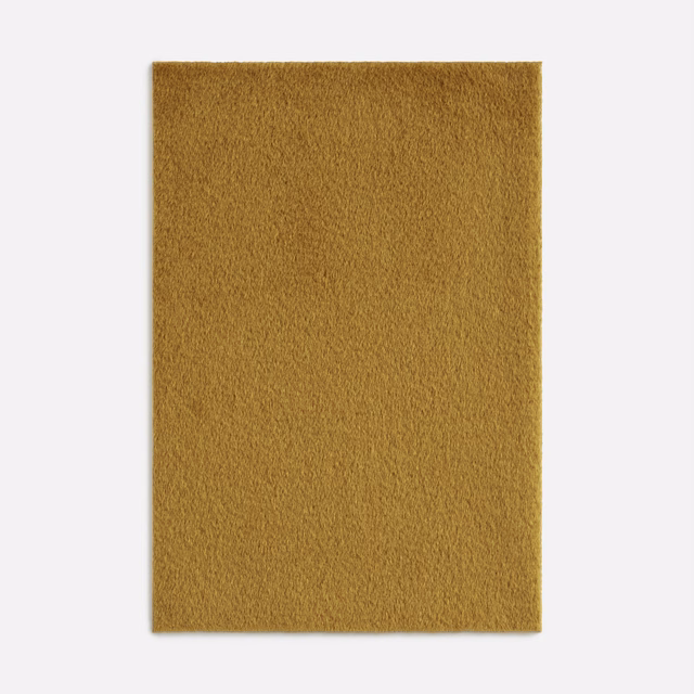 Mustard ochre plain curtain fabric with a dense, softly brushed short pile