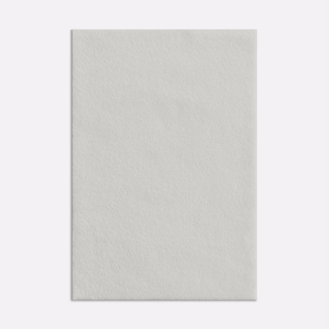 Pale warm grey curtain fabric with softly brushed alpaca-like plain texture