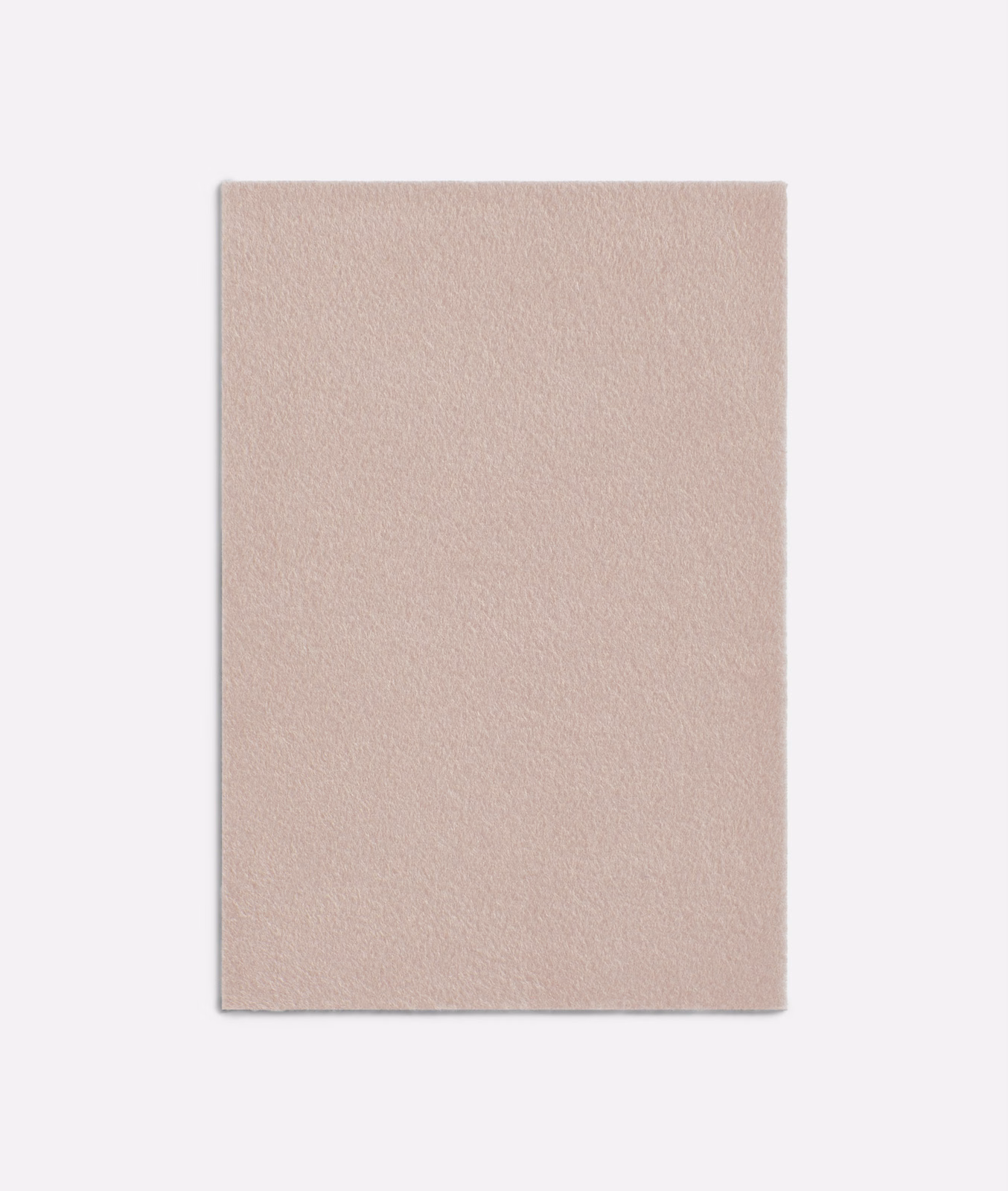 Warm blush-nude plain textile with a softly brushed, even surface