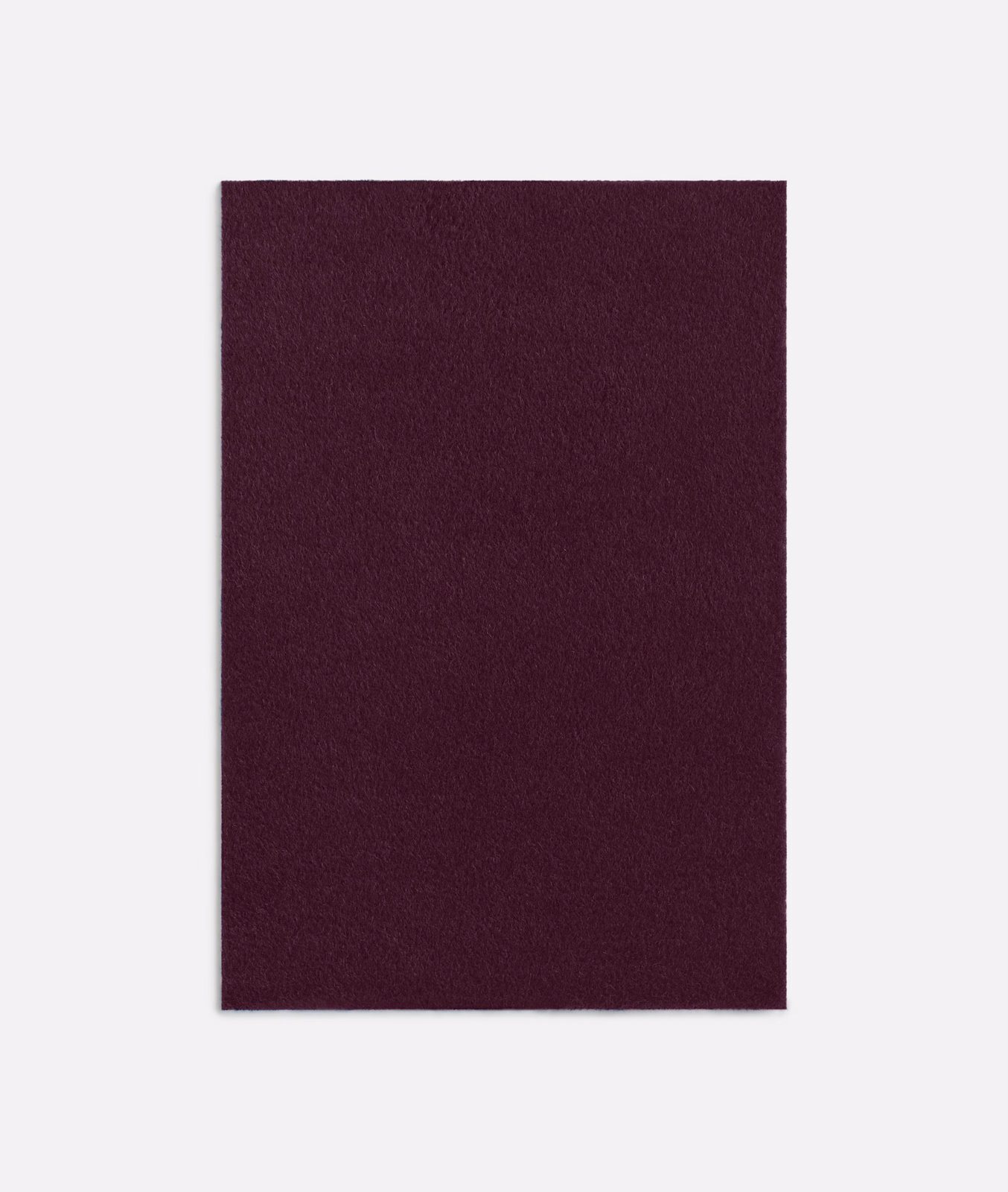 Deep plum alpaca-textured swatch with a soft, subtly brushed surface