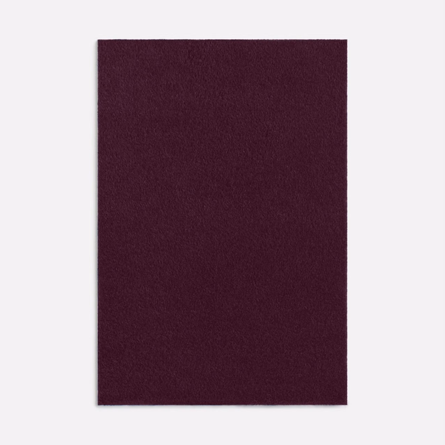 Deep plum alpaca-textured swatch with a soft, subtly brushed surface