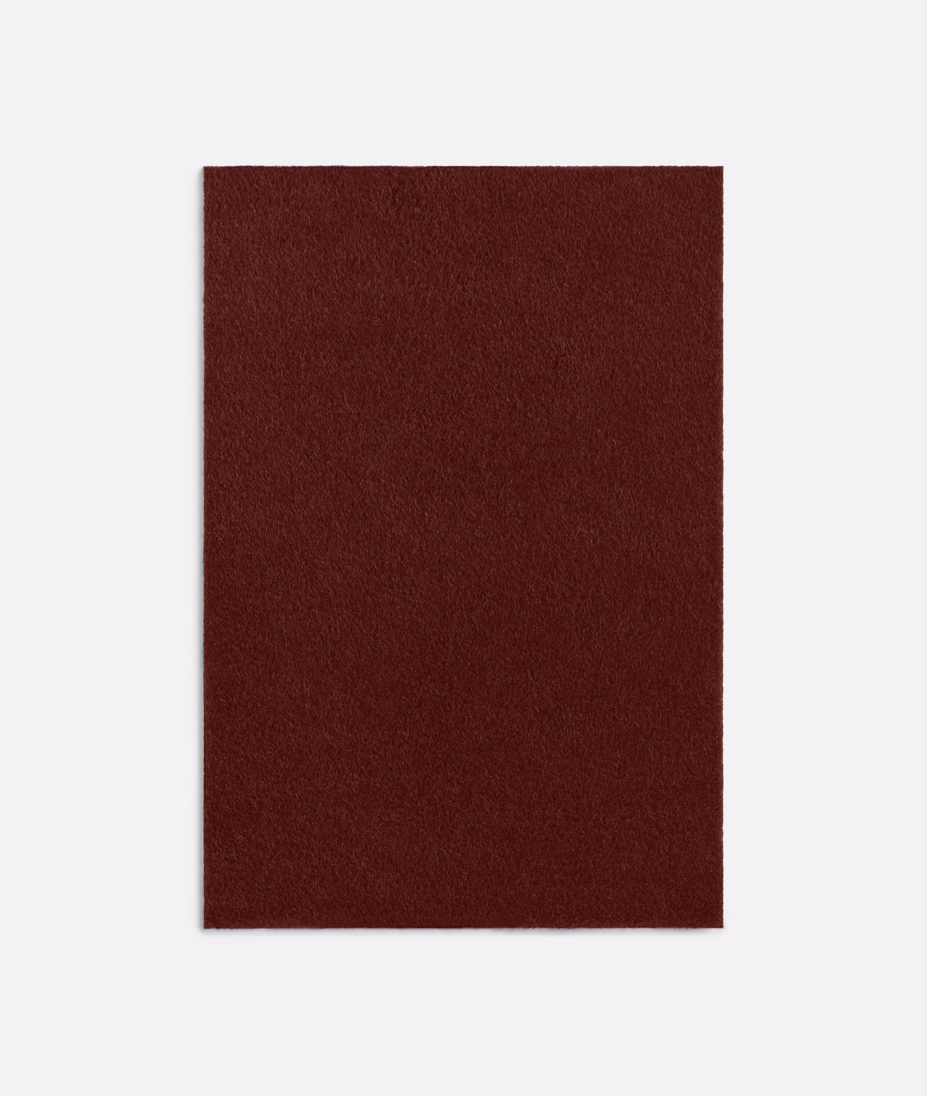 Deep oxblood-red fabric swatch with softly brushed, low-sheen texture
