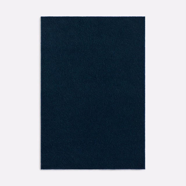 Deep storm-blue curtain fabric swatch with a softly brushed, velvety surface