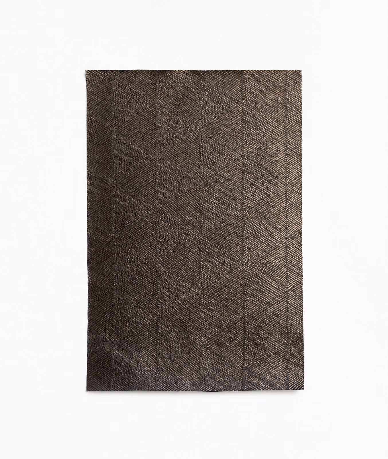 Deep bronze-brown curtain fabric with fine herringbone lines and angular panel divisions