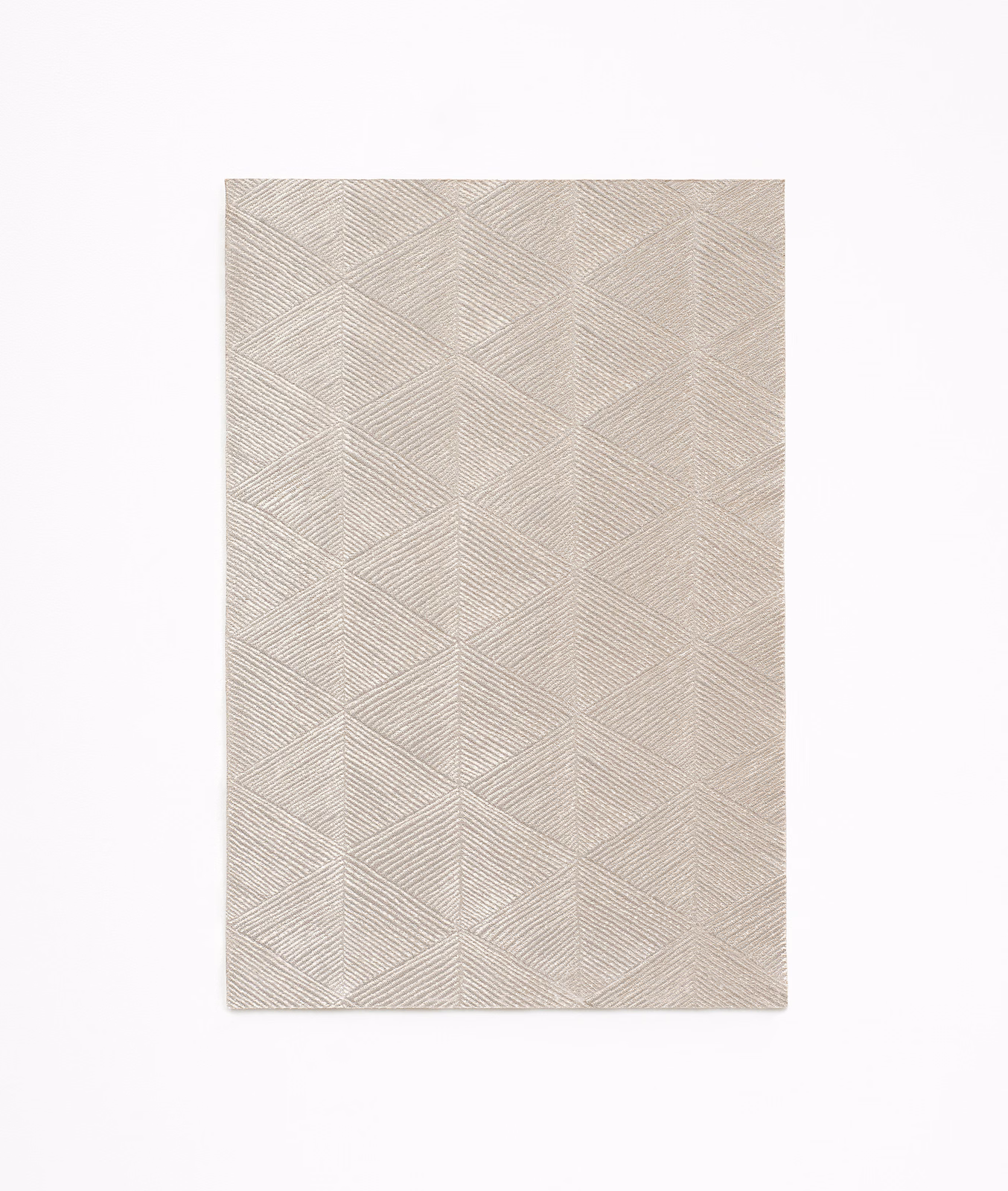 Pale greige swatch with fine interlocking chevron lines and subtle woven texture