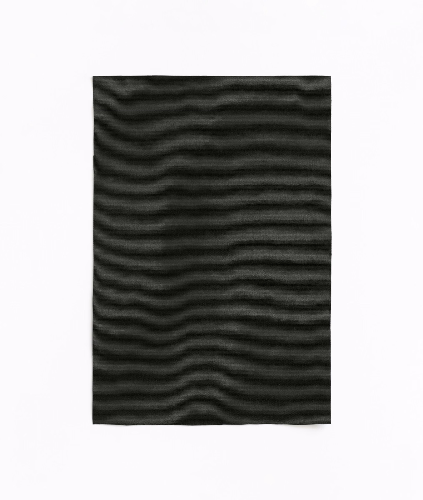 Deep anthracite curtain fabric with soft, shadowy tonal bands and a fine woven surface
