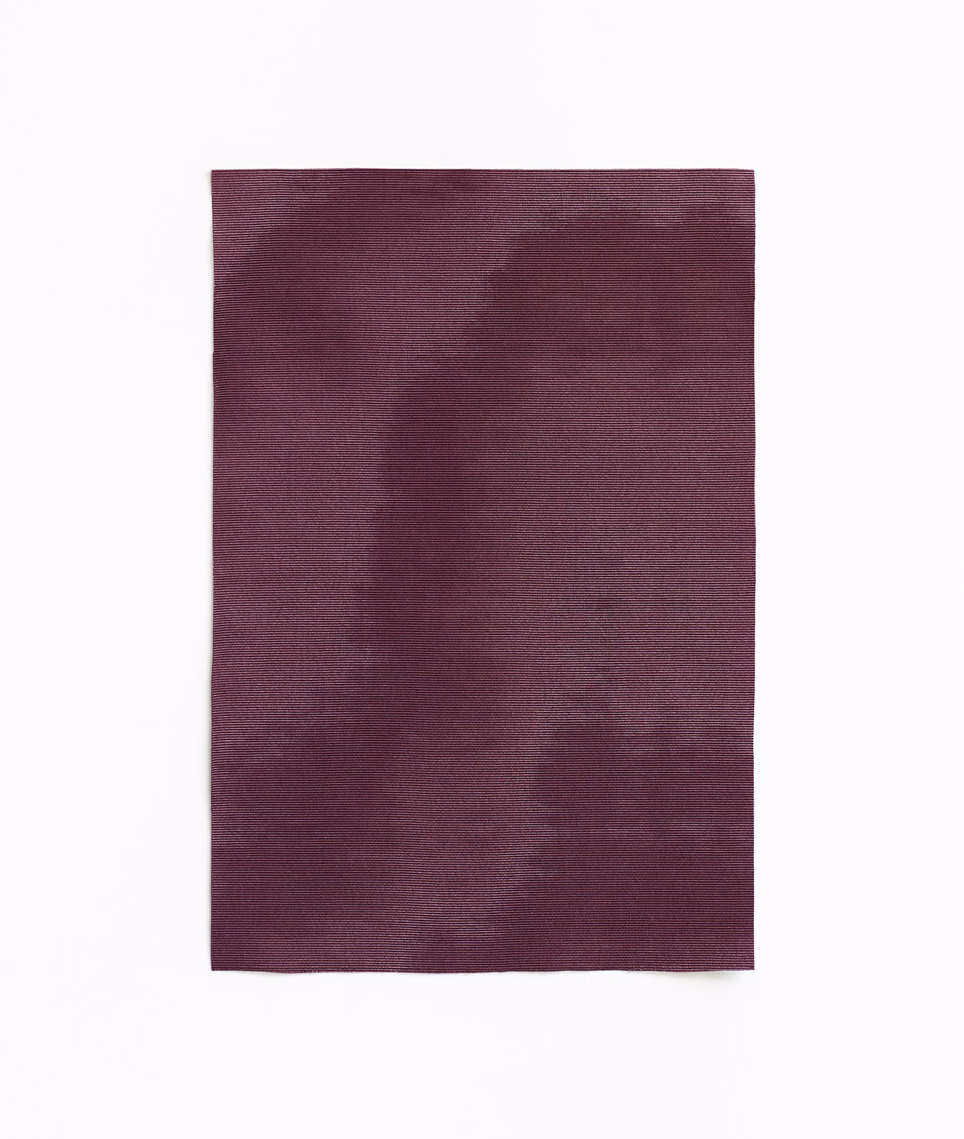 Deep aubergine curtain cloth with hazy tonal bands and fine horizontal weave