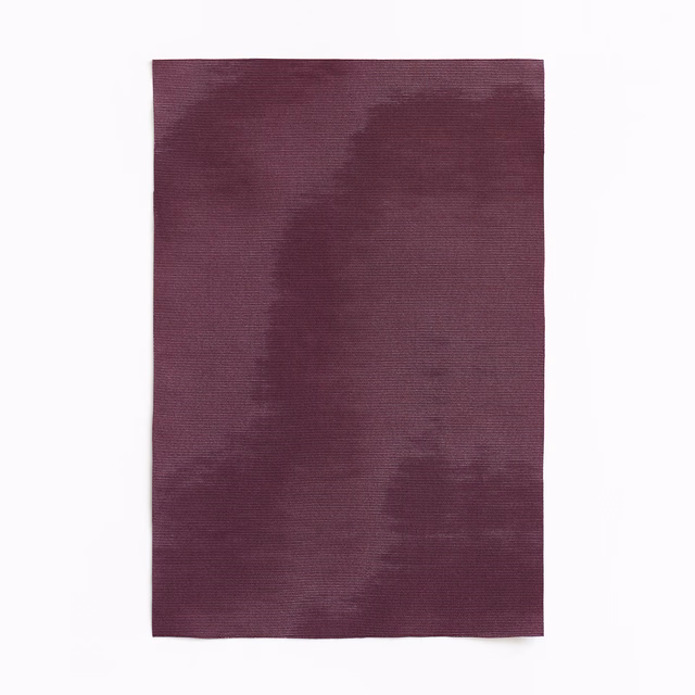 Deep aubergine curtain cloth with hazy tonal bands and fine horizontal weave