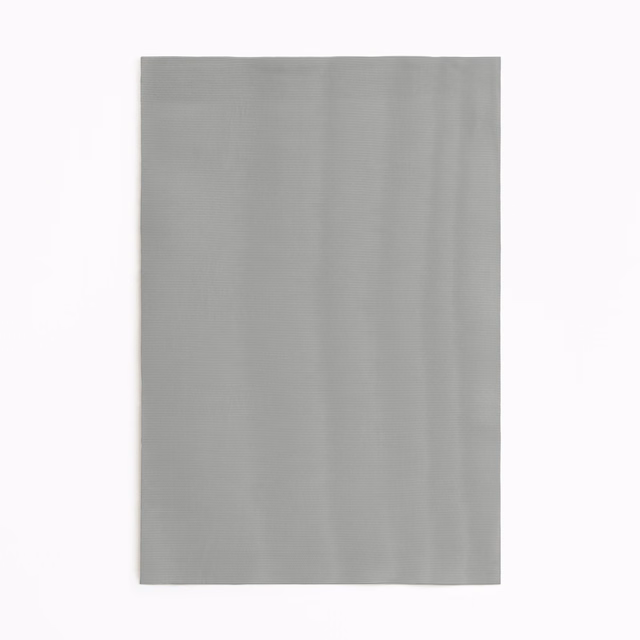 Pale celadon-grey curtain fabric with subtle vertical tonal striations and a soft sheen