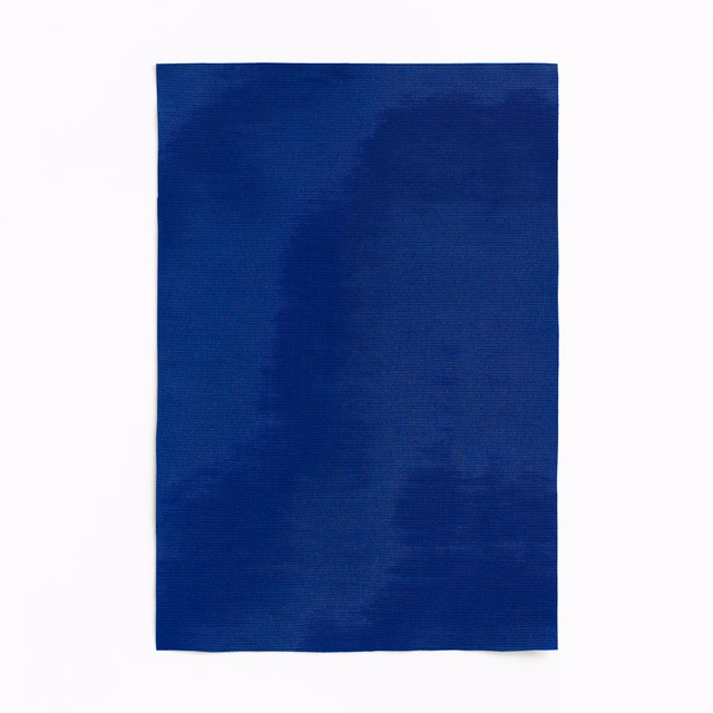 Deep cobalt blue woven swatch with subtle darker and lighter abstract tonal patches