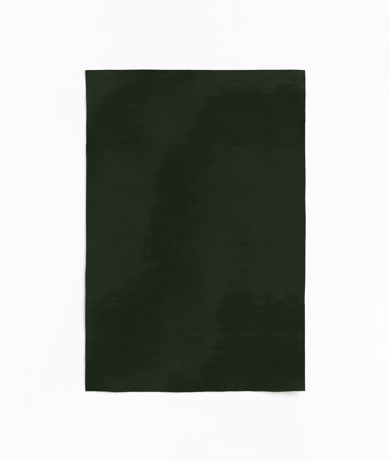 Deep forest-green textile swatch with subtle shadowed tonal variation and matte weave