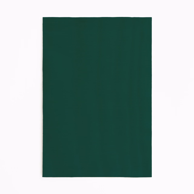 Deep malachite green curtain fabric swatch with a subtle, even surface texture