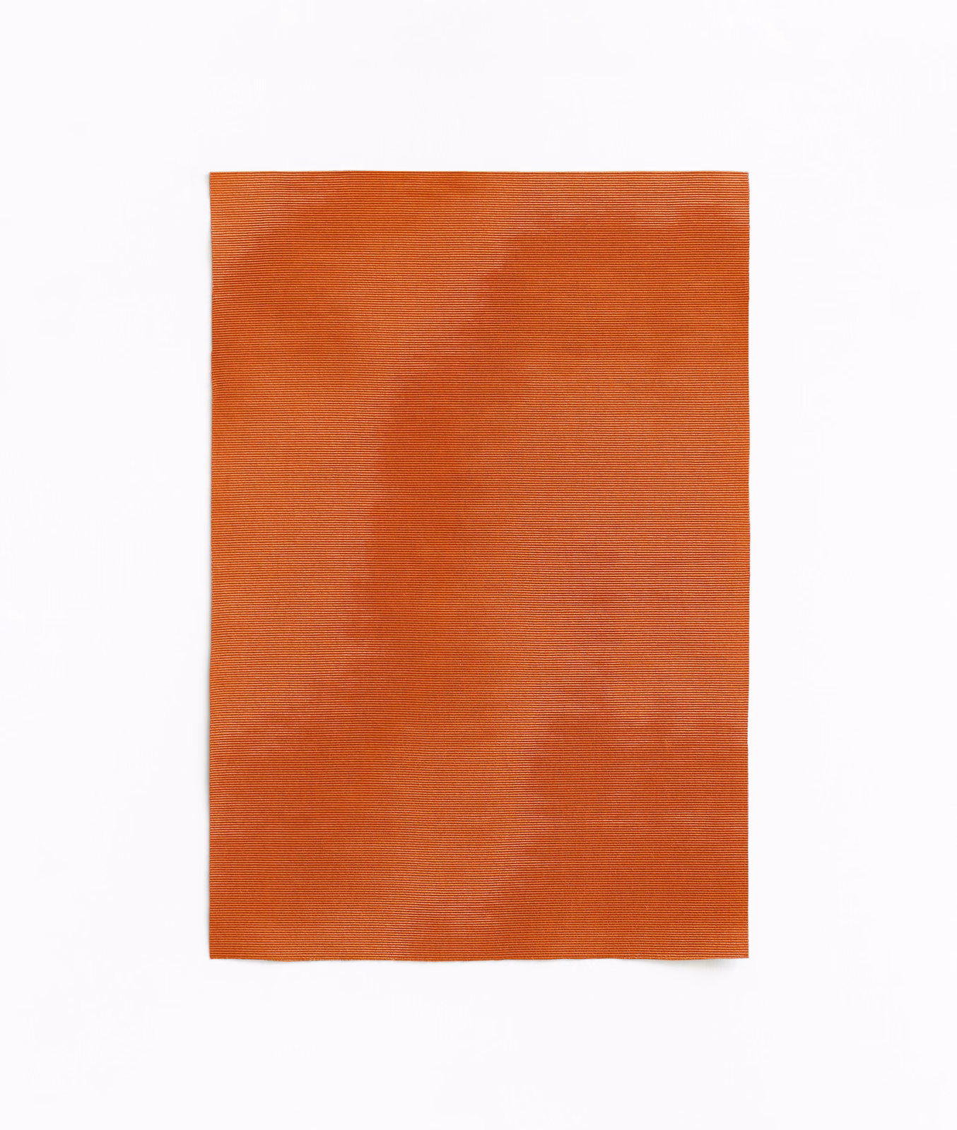 Warm mandarin-orange woven swatch with softly cloudy tonal bands and fine texture
