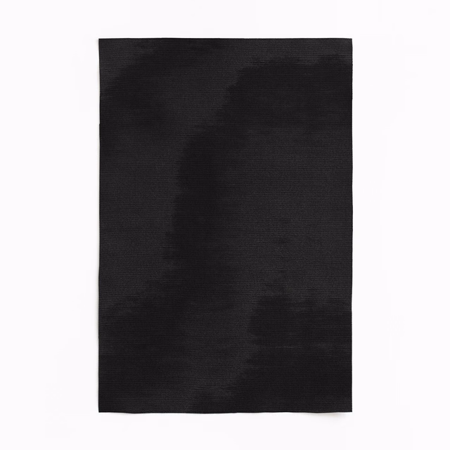 Near-black woven textile with soft charcoal clouding and restrained horizontal sheen
