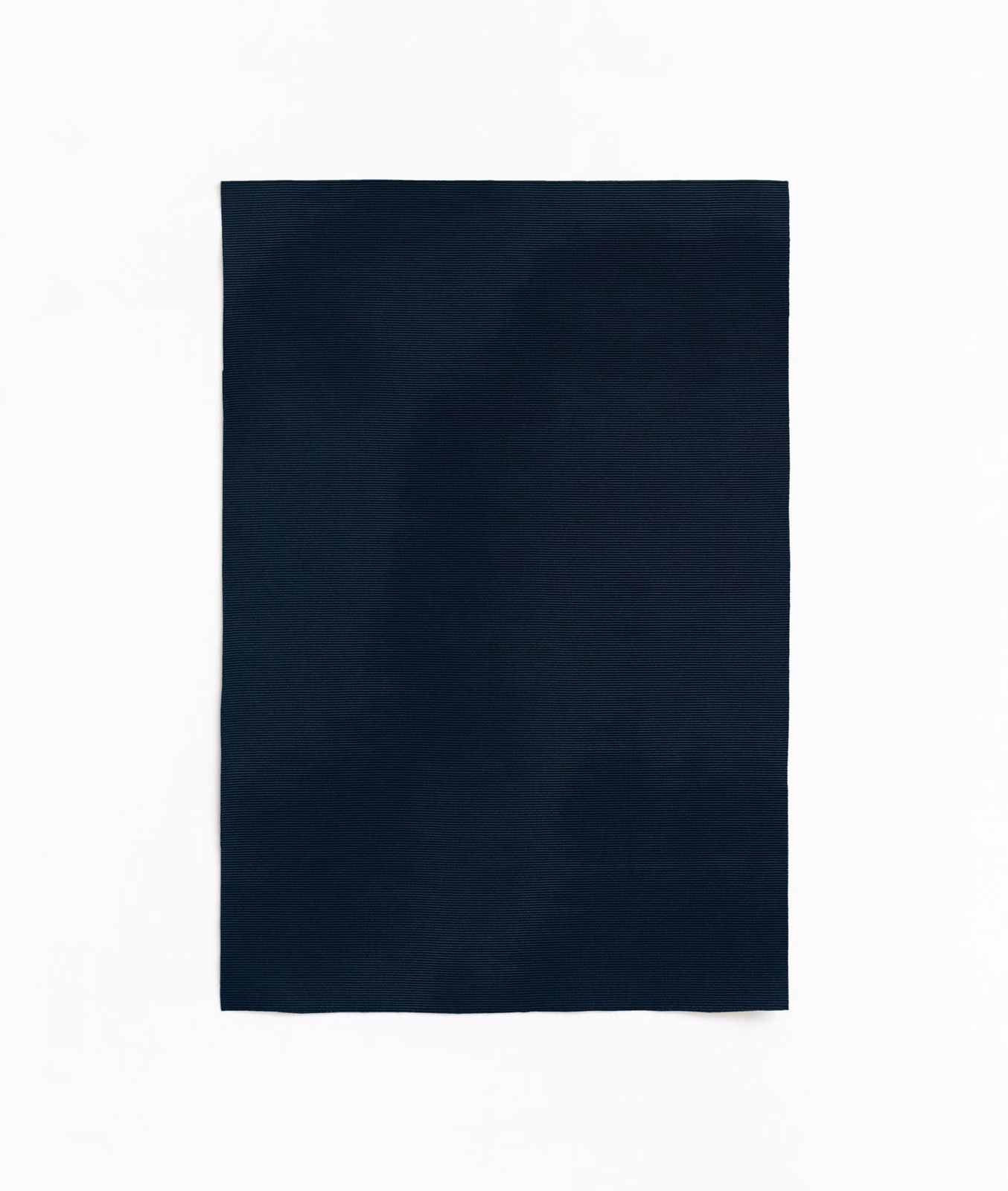 Deep ink navy plain fabric swatch with subtle tonal surface variation