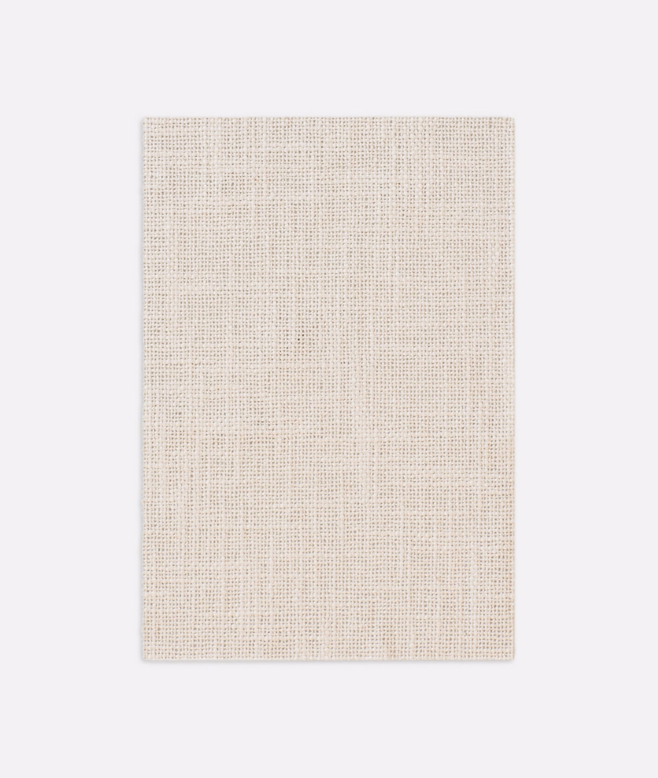 Warm ecru curtain fabric with a fine, even crosshatched woven texture