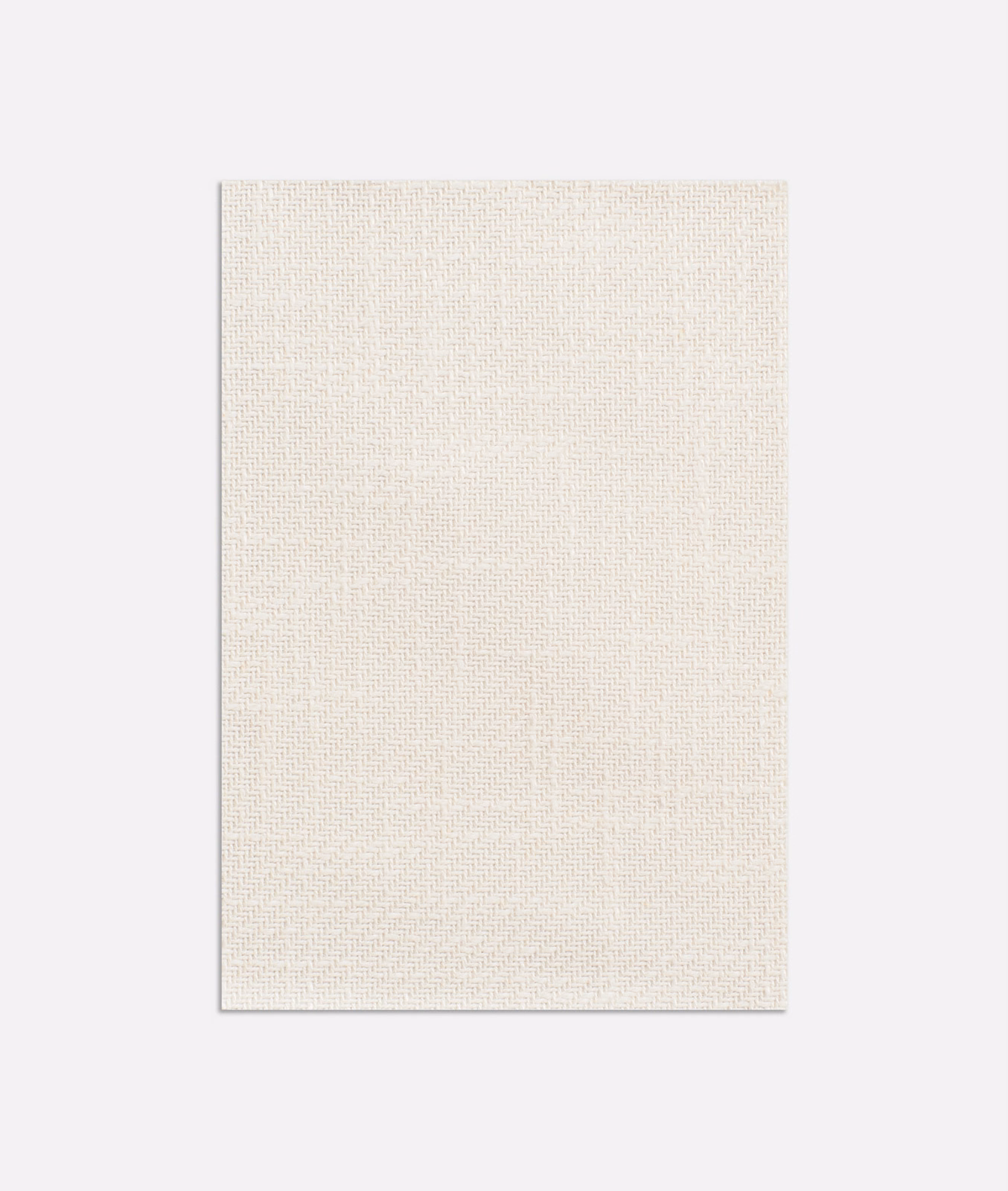 Light latte beige fabric with a fine cream micro-grid weave and softly textured surface