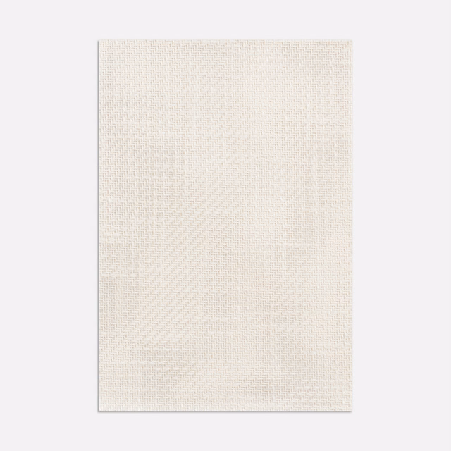 Light latte beige fabric with a fine cream micro-grid weave and softly textured surface
