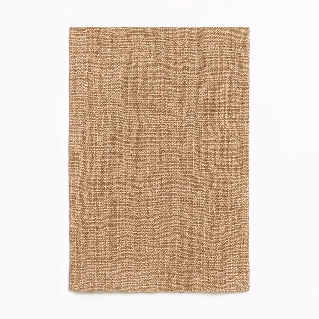 Warm biscuit-beige woven swatch with a subtle irregular grid texture