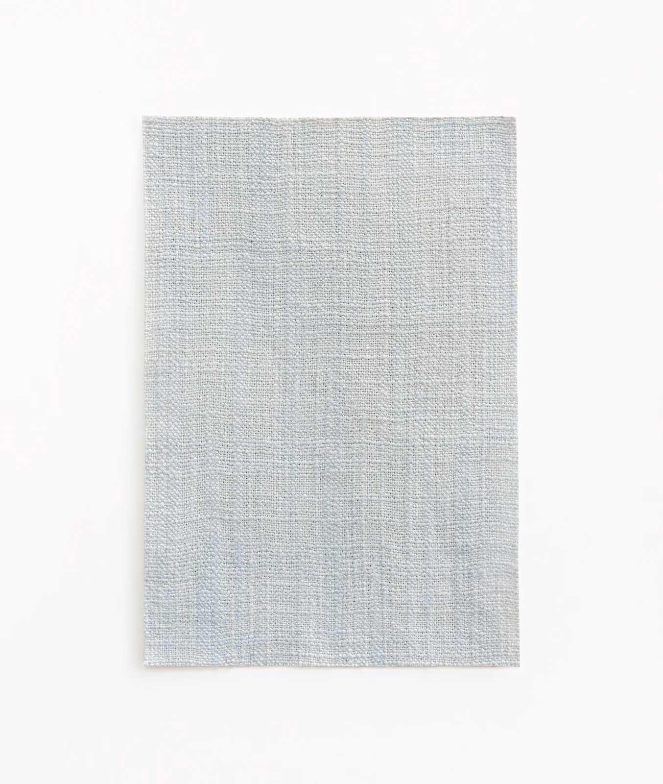 Pale glacier blue-grey woven fabric with subtle vertical striations