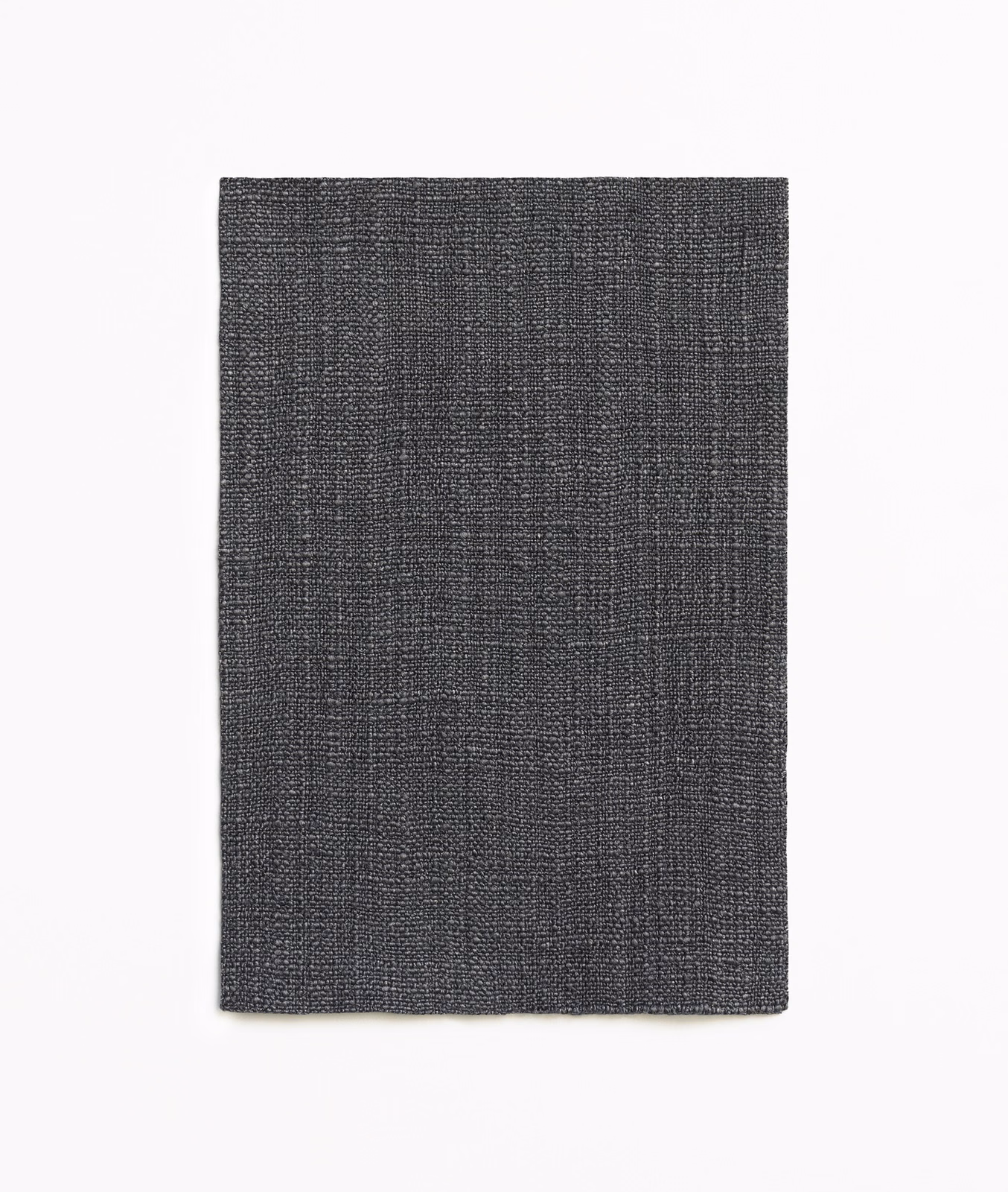 Deep charcoal grey textile with a subtle crosshatched woven surface