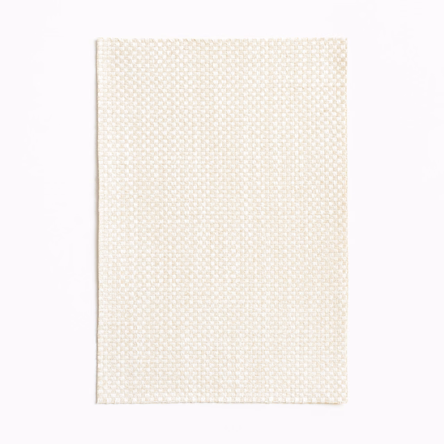 Warm ivory curtain fabric swatch with a tiny regular woven basket texture