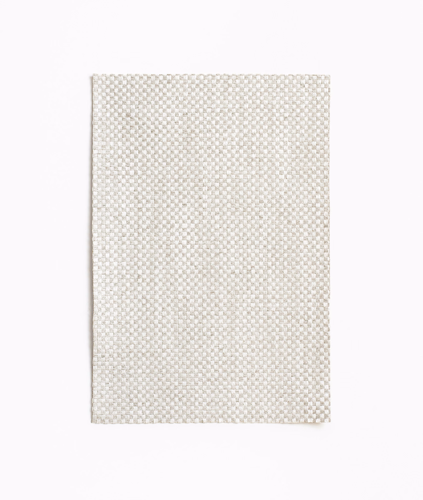 Pale ivory curtain fabric with a tiny woven check and subtle grey flecks