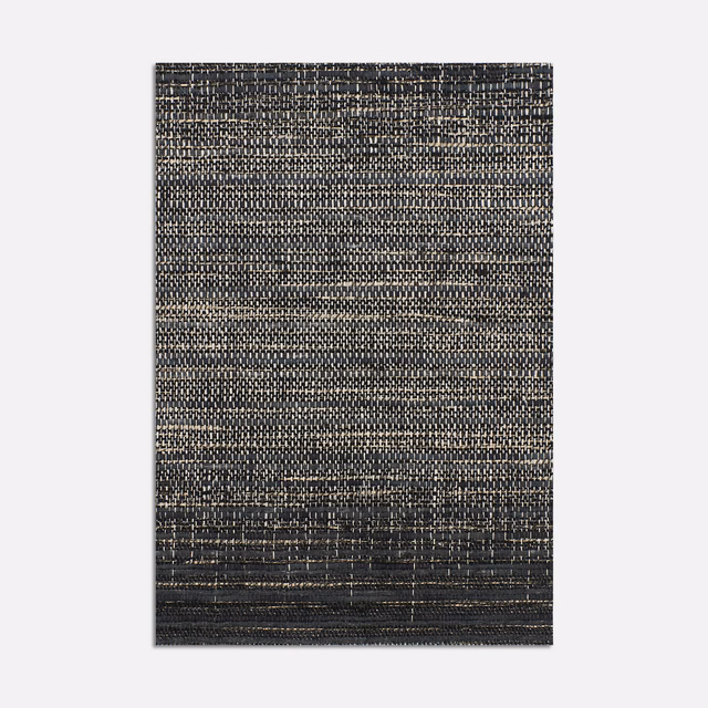 Charcoal-black Dedar textile with taupe flecks and irregular horizontal woven striations