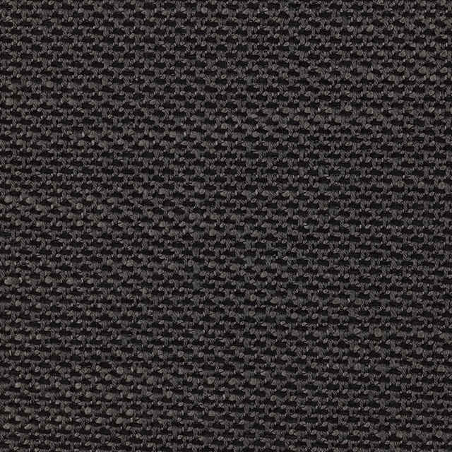 Close-up of charcoal-black woven fabric with dense grey flecks and nubby texture