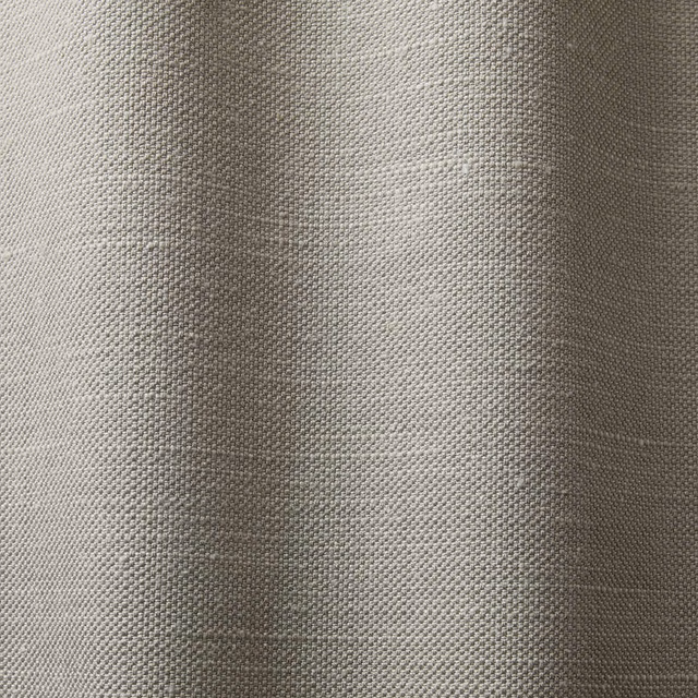 Close-up of cool light grey fabric with a small, pebbled woven texture