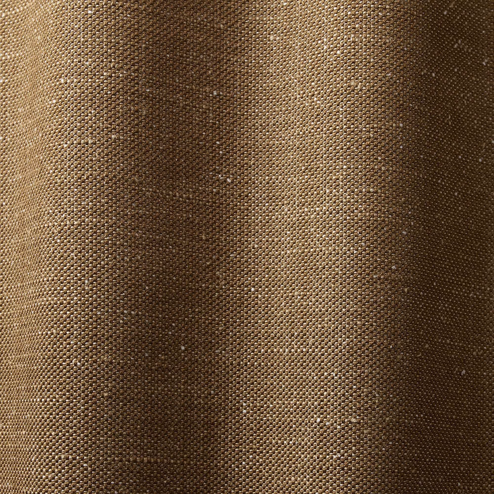Close-up of Nutty Brown’s tight brown weave with softly shifting vertical tonal bands