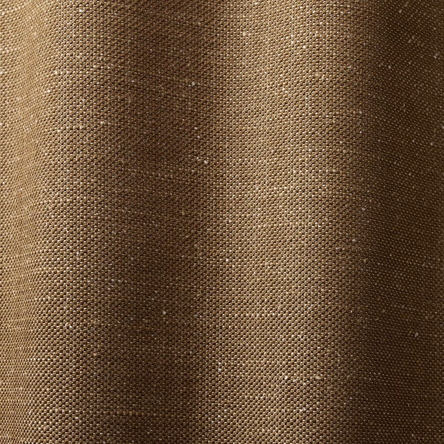 Close-up of Nutty Brown’s tight brown weave with softly shifting vertical tonal bands