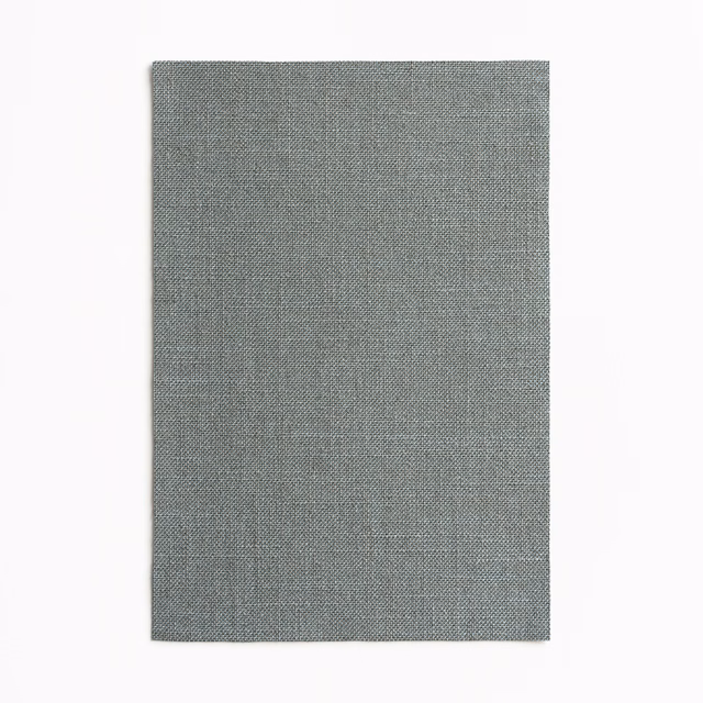 Cool grey-green chambray weave with subtle mottling on a rectangular swatch