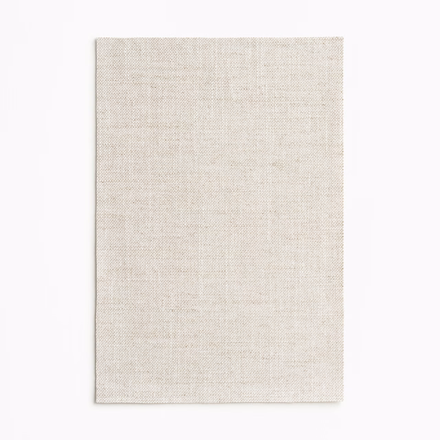 Pale ecru curtain fabric with a fine, softly flecked plain weave