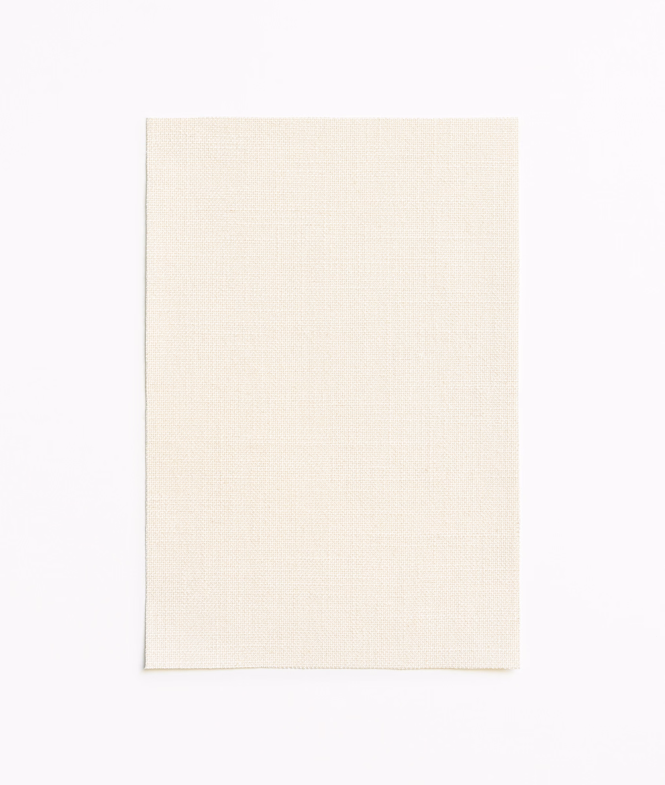 Warm ivory swatch with a fine, subtle crosshatch weave and matte texture