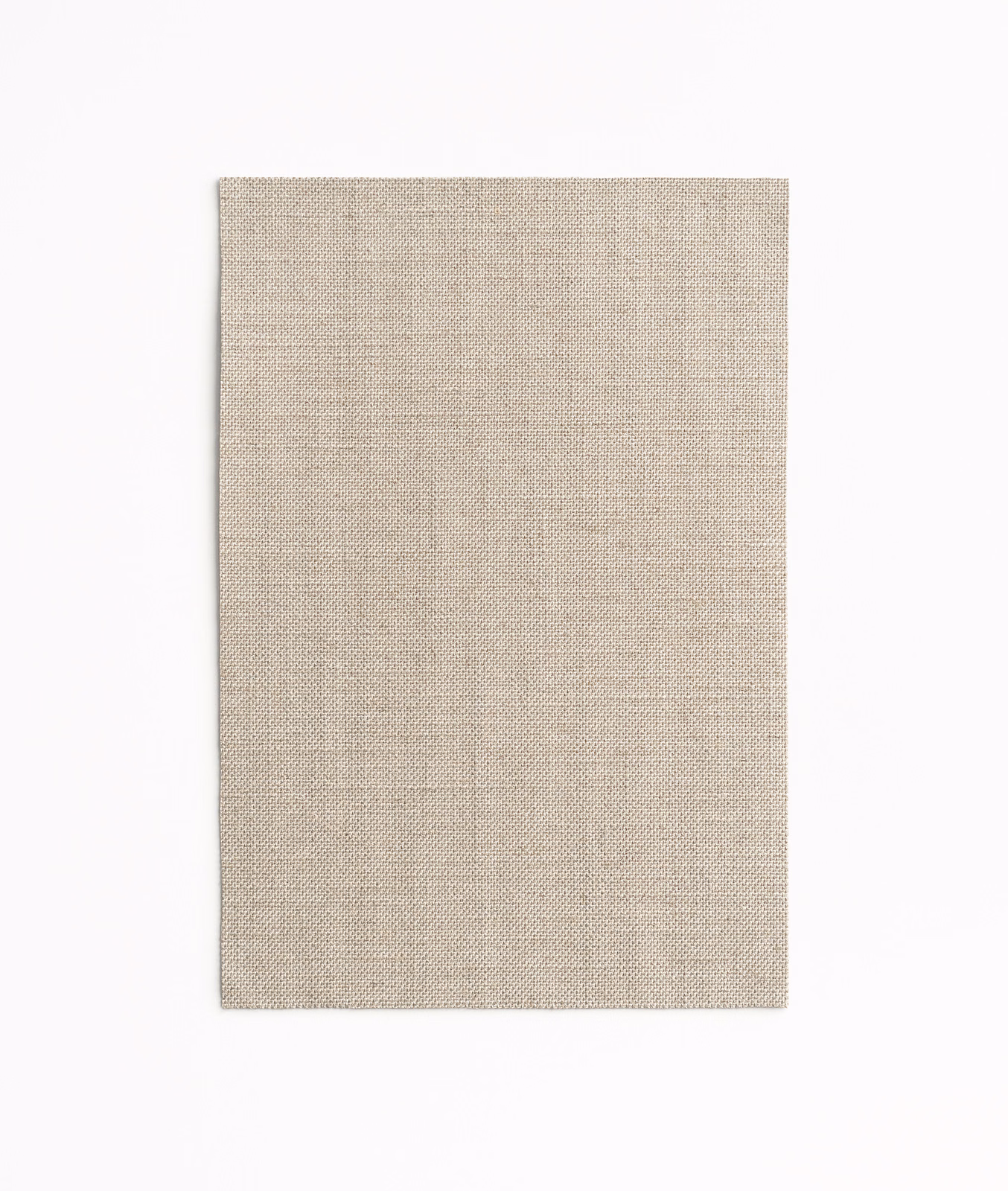 Close view of soft greige-taupe fabric with a fine crosshatched woven texture