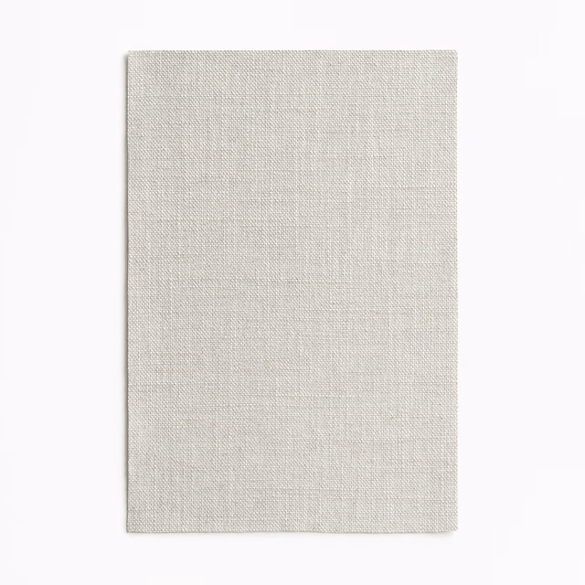 Pale nacre greige woven swatch with a fine, even chambray texture