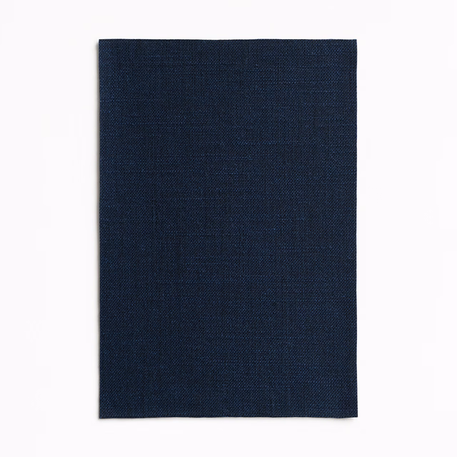 Deep ink navy fabric swatch showing a fine, subtly textured woven surface